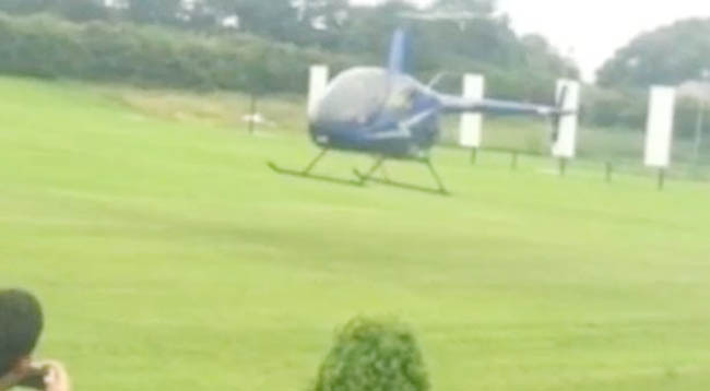 Cricket-club-use-a-helicopter-to-dry-out-the-pitch-and-avoid-a-weather-wash-out