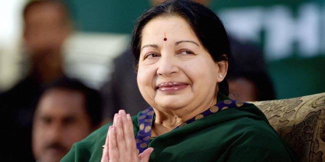 AIADMK leader Jayaram Jayalalitha greets the audience during her swearing-in-ceremony as the Chief Minister of Tamil Nadu state in Chennai, India, Saturday, May 23, 2015. An appeals court acquitted the powerful politician in southern India of corruption charges earlier this month, clearing the way for her to return to public office. She was forced last year to step down as the highest elected official in Tamil Nadu after a Bangalore court in September convicted her of possessing wealth disproportionate to her income and sentenced her to four years in prison. (R. Senthil Kumar/ Press Trust of India via AP)