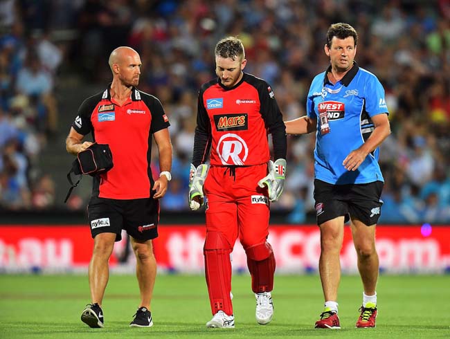 ADELAIDE, AUSTRALIA - JANUARY 16:  Peter Nevill of the Melbourne Renegades walks from the field after being struck in the head by the bat of Brad Hodge of the Adelaide Strikers during the Big Bash League match between the Adelaide Strikers and the Melbourne Renegades at Adelaide Oval on January 16, 2017 in Adelaide, Australia.  (Photo by Daniel Kalisz/Getty Images)