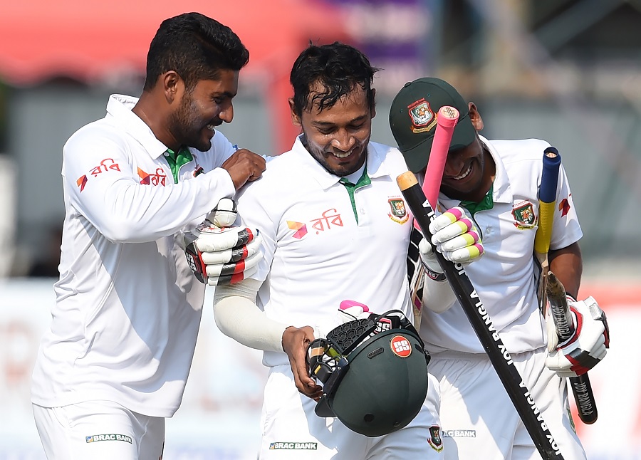 Bangladesh captain Mushfiqur Rahim (C) and teammates celebrate their victory over Sri Lanka by four wickets on the fifth and final day of the second and final Test cricket match between Sri Lanka and Bangladesh at The P. Sara Oval Cricket Stadium in Colombo on March 19, 2017. / AFP PHOTO / Ishara S. KODIKARA (Photo credit should read ISHARA S. KODIKARA/AFP/Getty Images)