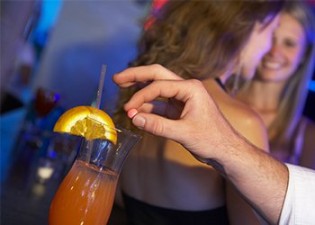 xrecovery_shutterstock-30929878-drugging-drink-date-rape-floating.jpg.pagespeed.ic.O5GF8bPs7b